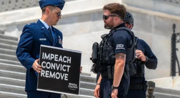 Air Force major who called for Trump’s impeachment is locked in solitary confinement 24/7: Lawyer